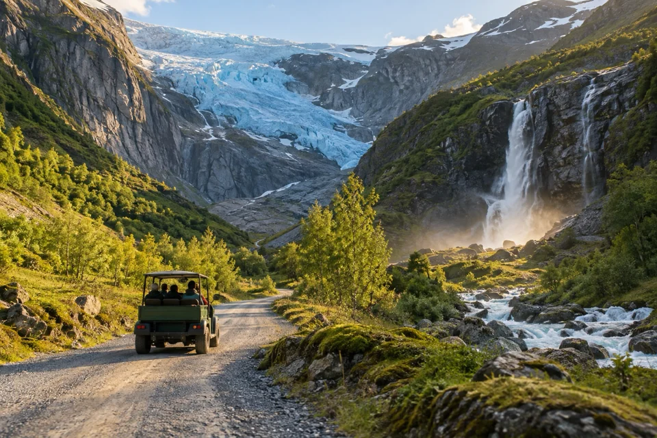Small open troll car on the path beneath the blue tongue of the Briksdal Glacier