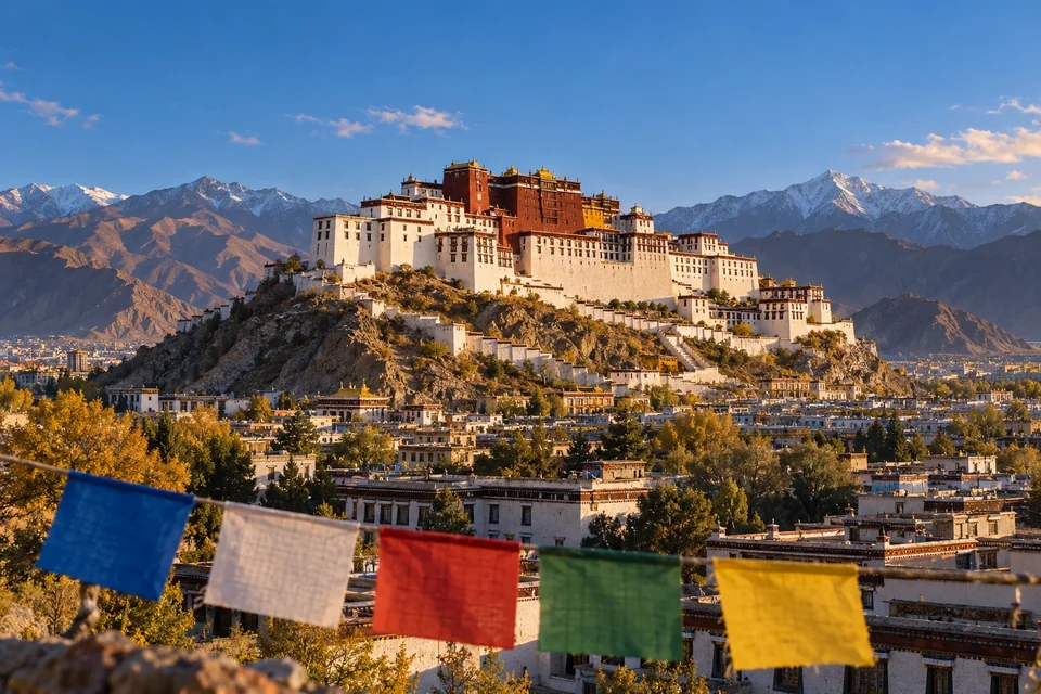 Monumental white and red hillside palace with prayer flags; visualisation