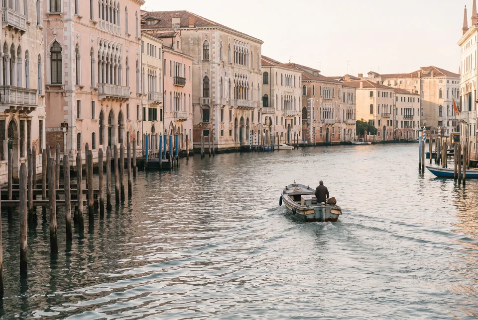 Palaces and a motor boat on the Grand Canal in Venice in morning light, visualization