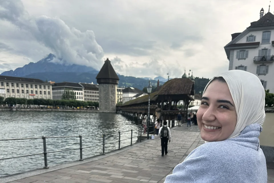 The Chapel Bridge and Water Tower in Lucerne with Mount Pilatus behind, Switzerland