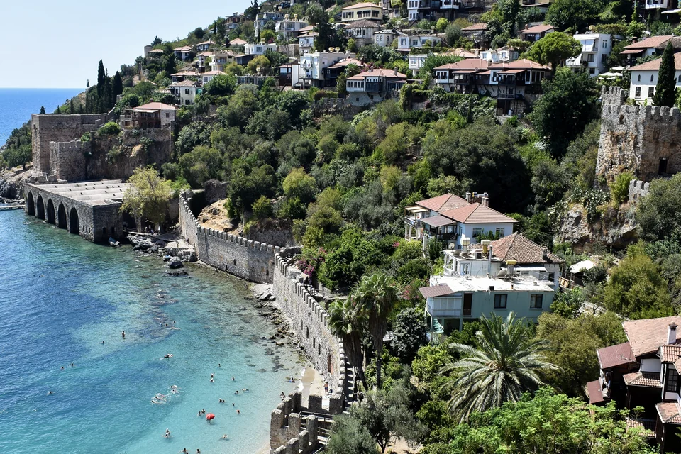 The historic shipyard, walls and turquoise sea below Alanya Castle