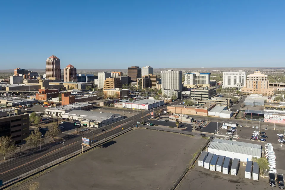 Downtown Albuquerque buildings and the wide plain seen from above