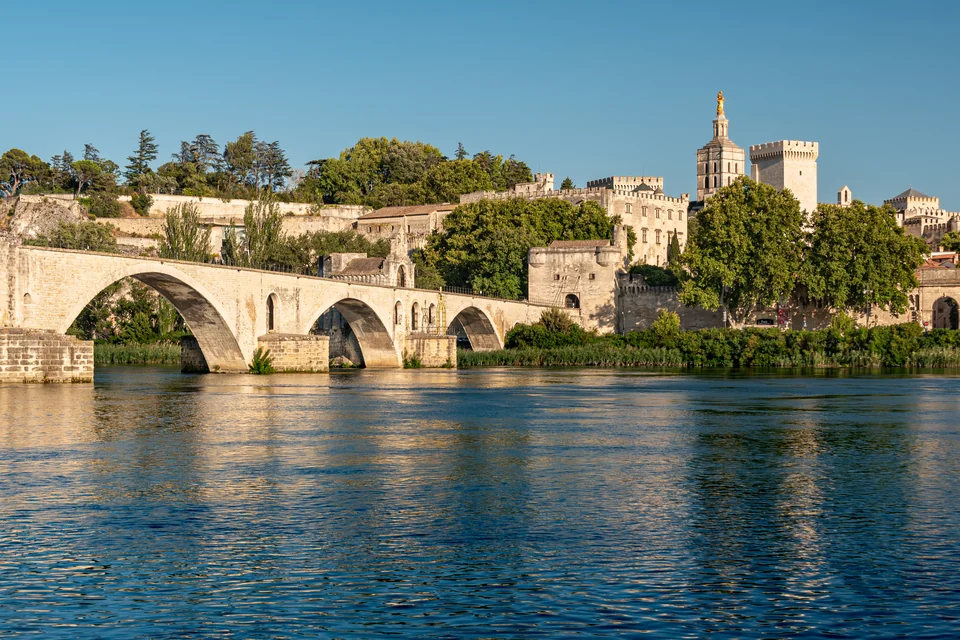 The broken Saint-Bénézet Bridge over the Rhône with the Palais des Papes behind, Avignon