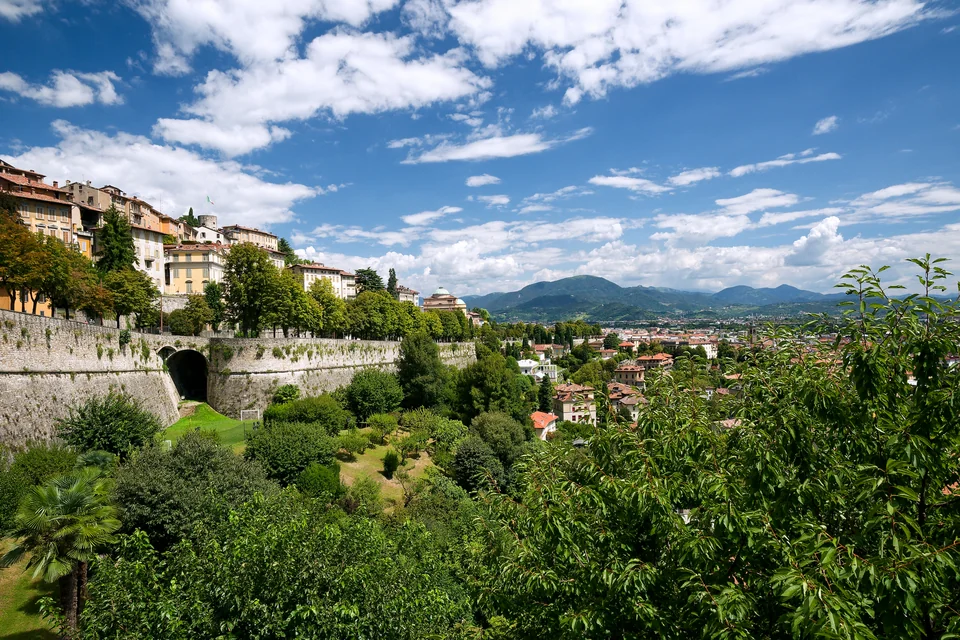 The Venetian walls and gardens of Bergamo's Upper Town with hills beyond
