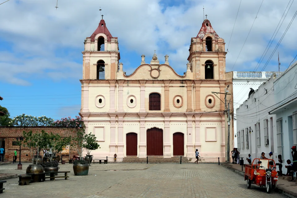 The two-towered pink Church of Our Lady of Carmen on Plaza del Carmen in Camagüey