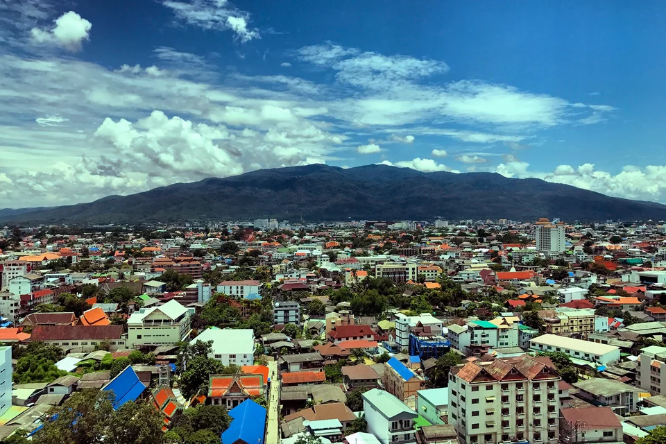 Colourful rooftops of Chiang Mai with Doi Suthep mountain behind