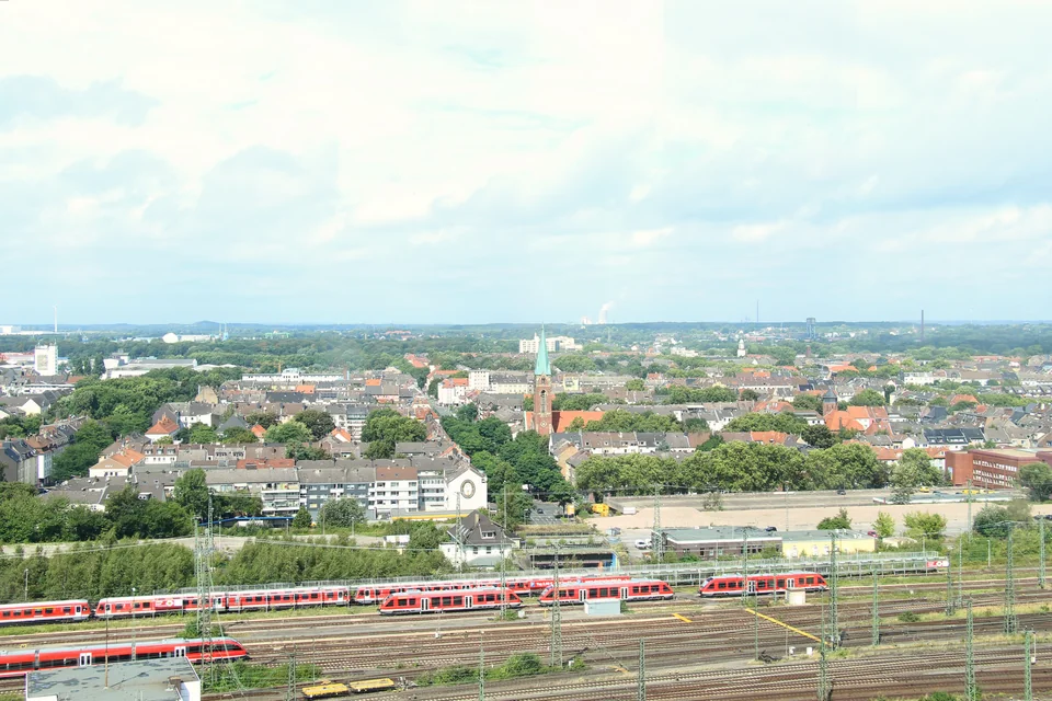 Dortmund seen from above with its railway and green neighbourhoods