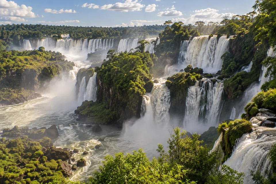 The Iguacu Falls spreading through the rainforest, seen from the Brazilian side