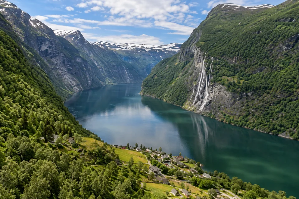 The Geirangerfjord and the Seven Sisters waterfall seen from above Geiranger