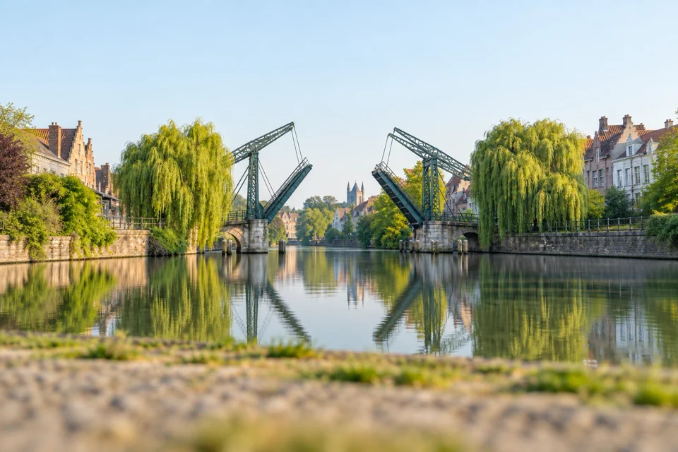 Lift bridge and willow-lined canal in Ghent