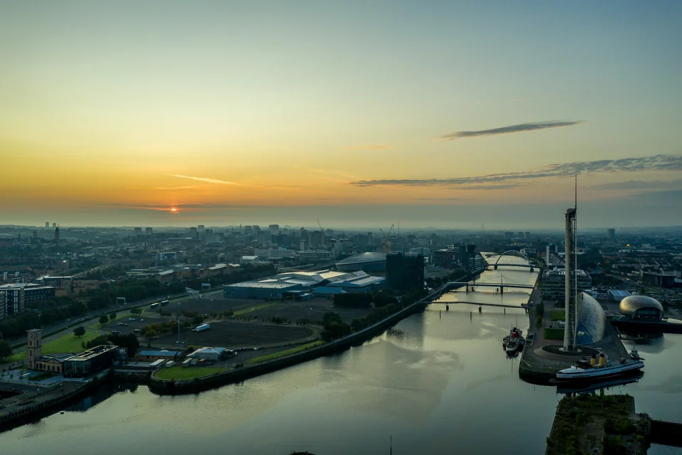 The River Clyde, the observation tower and the riverside at dawn in Glasgow