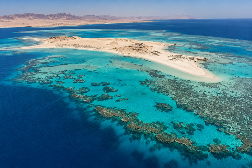 Turquoise shallows and coral reefs around Giftun Island off Hurghada, seen from the air