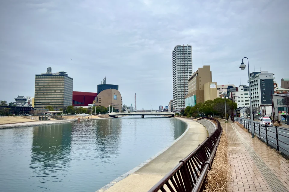 The Murasaki River, its riverside walk and high-rise buildings in Kitakyushu