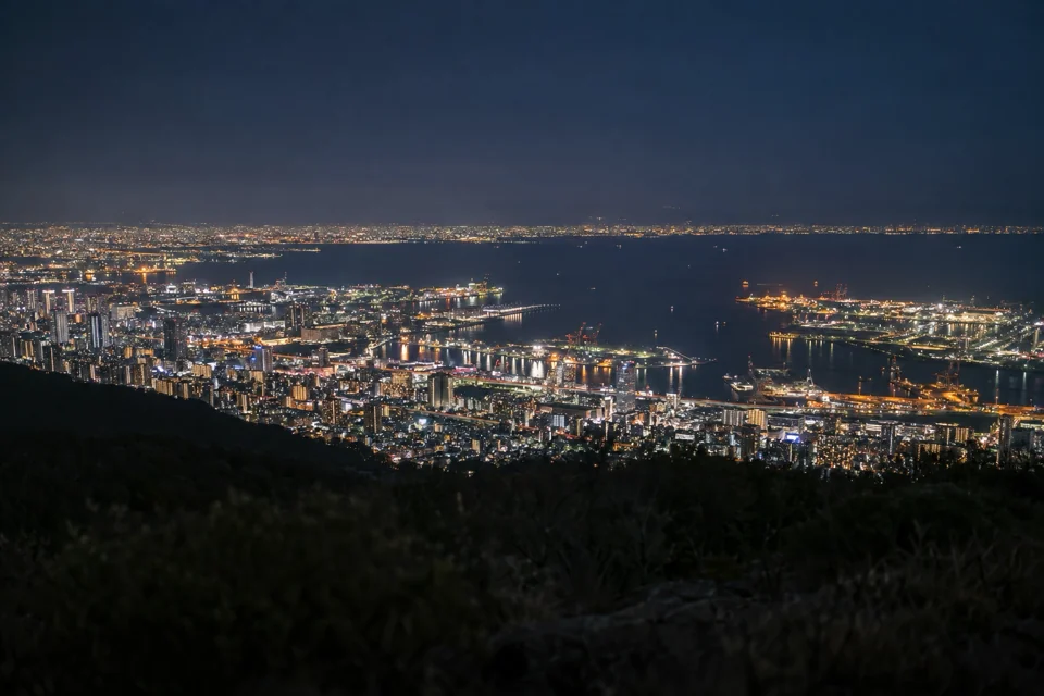 The harbour of Kobe at night seen from the hills