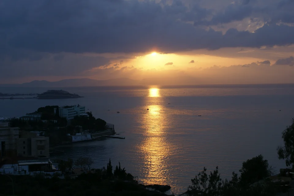 The Aegean Sea and coast at sunset in Kuşadası