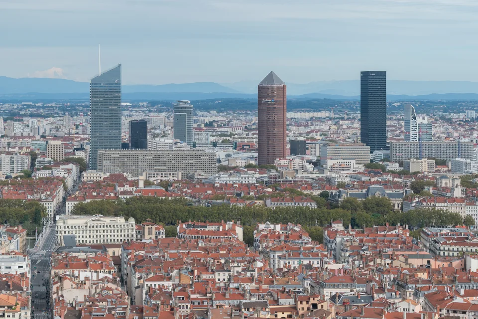 The Part-Dieu towers, red rooftops and the distant Alps in Lyon