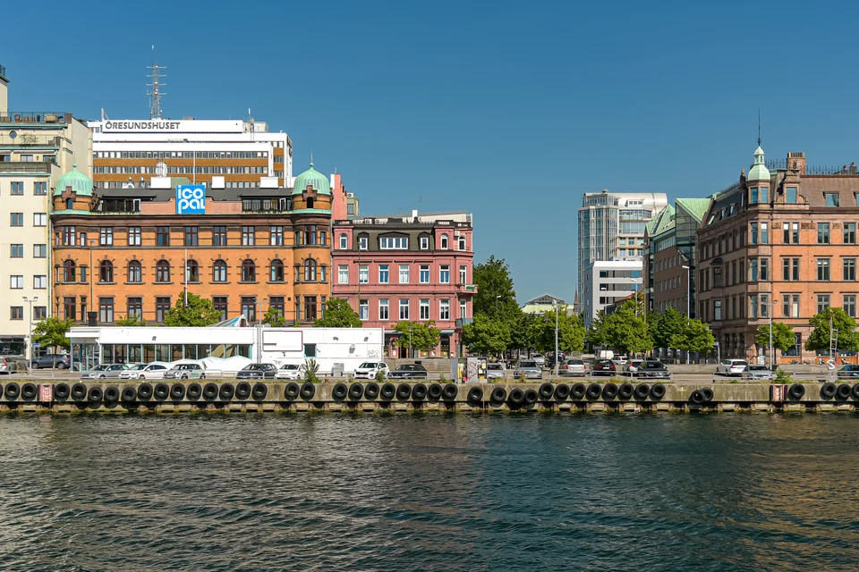 Historic buildings and the quay on the canal in Malmö