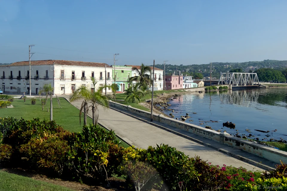The riverside promenade, historic buildings and an iron bridge in Matanzas