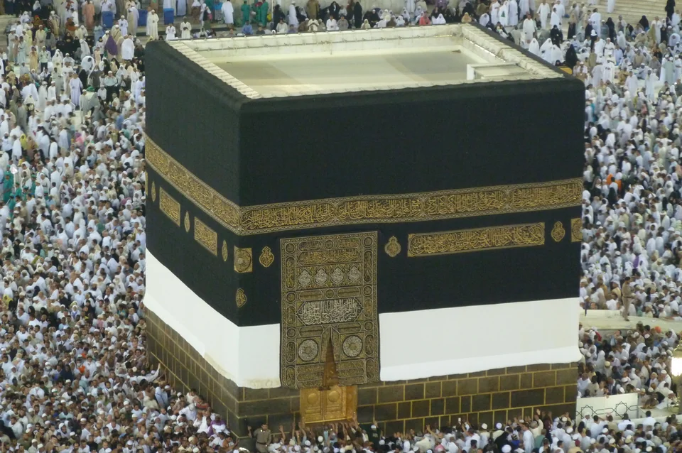 The Kaaba surrounded by pilgrims in the courtyard of the Masjid al-Haram