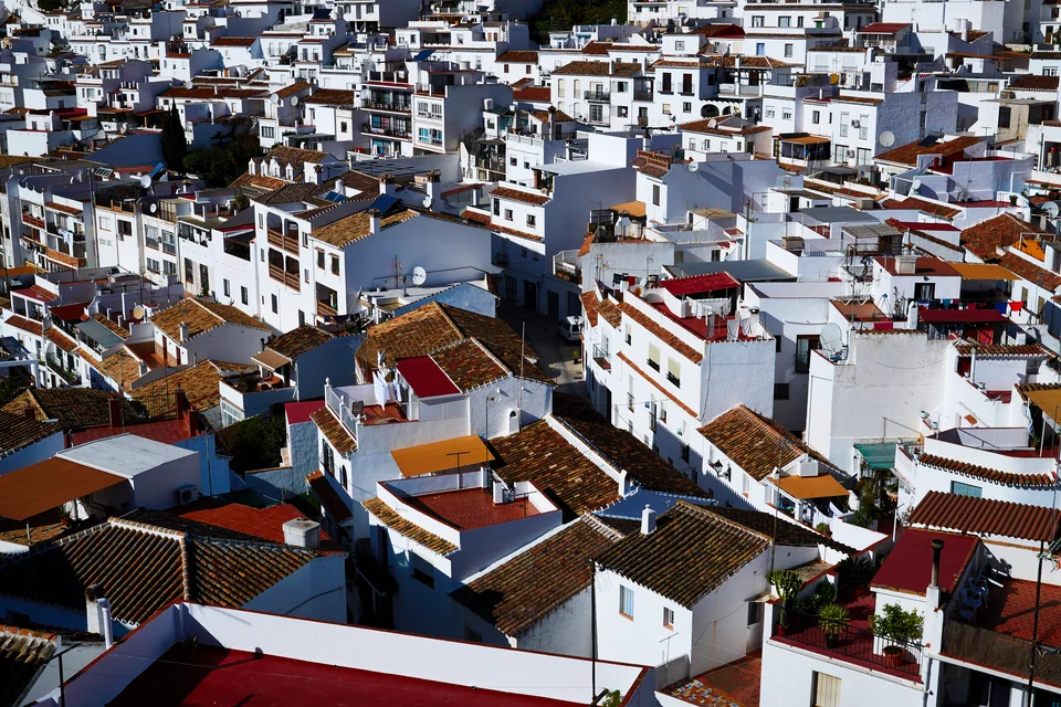 White houses and tiled roofs of Mijas seen from above
