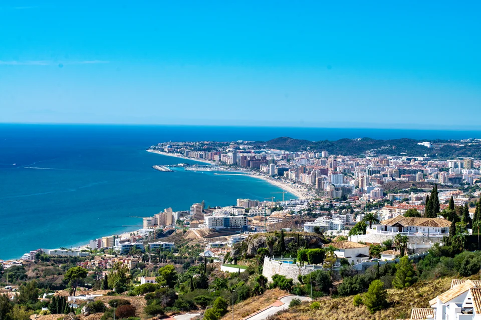 The Mediterranean coast and long beach seen from the hills of Mijas