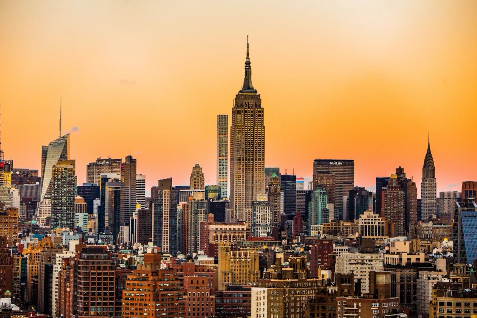 The Empire State Building and the Manhattan skyline at sunset, New York