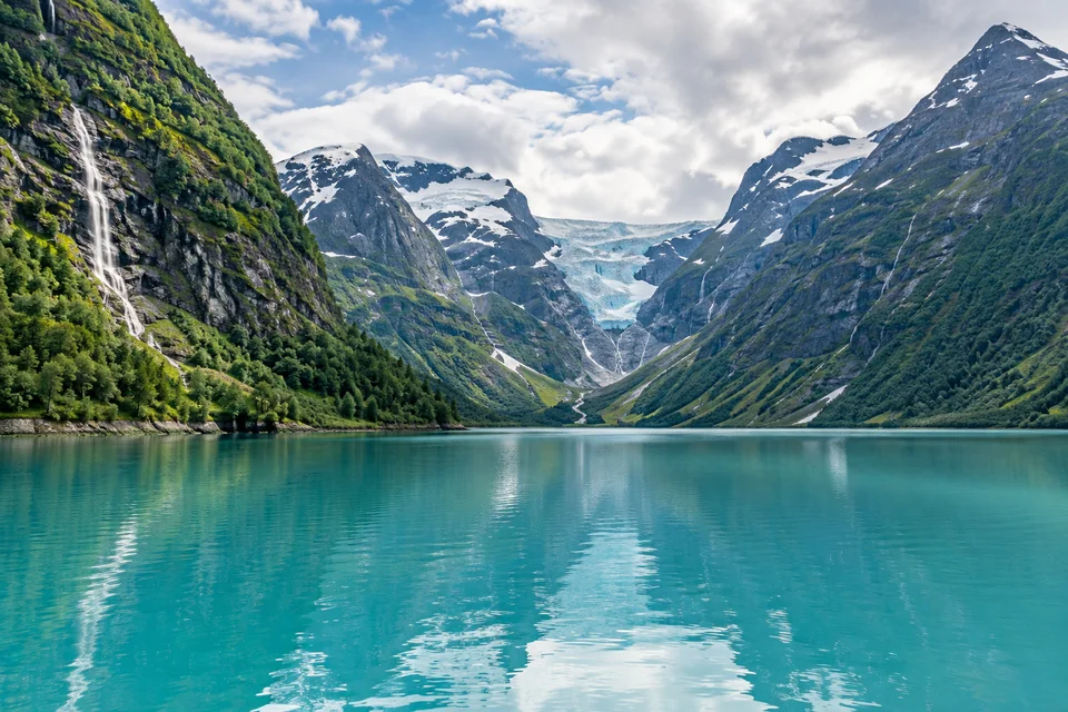 The glacier-fed turquoise Oldevatnet lake near Olden with a glacier at the valley's end