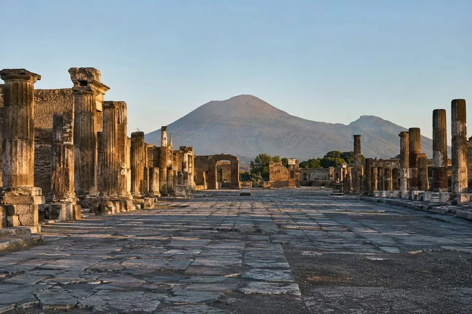 The Forum of Pompeii with Vesuvius behind it