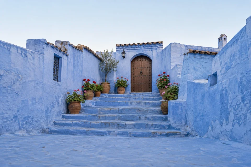 A blue-painted stepped street in Chefchaouen
