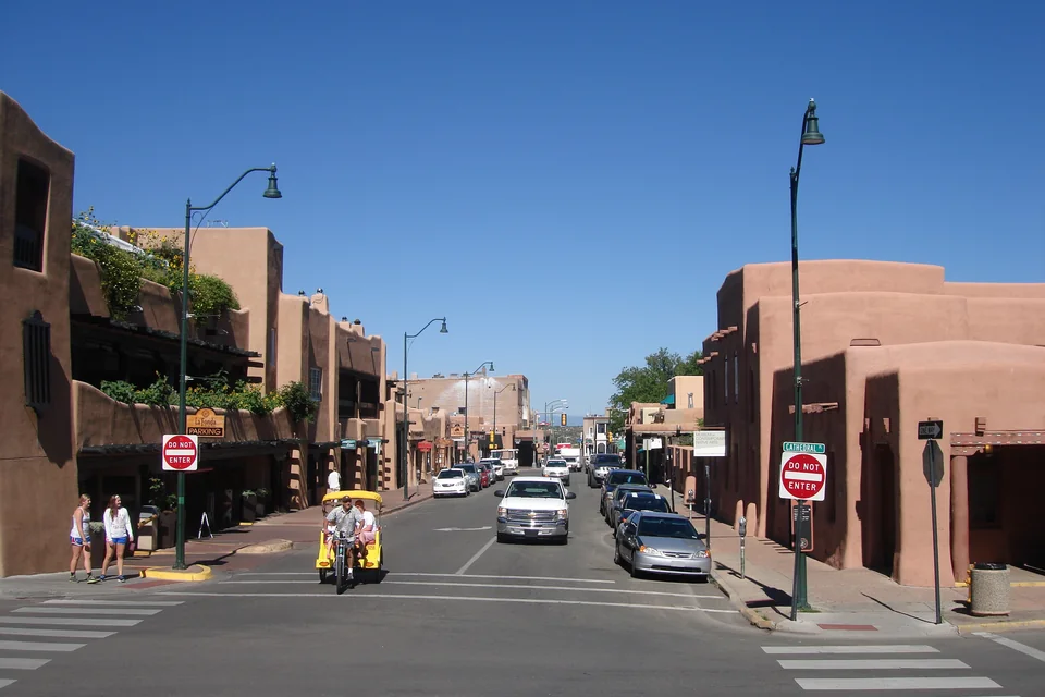 A street lined with adobe-fronted buildings in Santa Fe