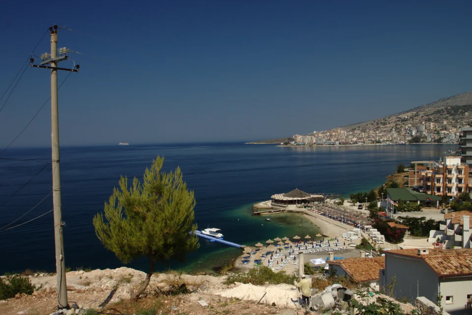 The Ionian Sea, beaches and the town in the distance on the Saranda coast