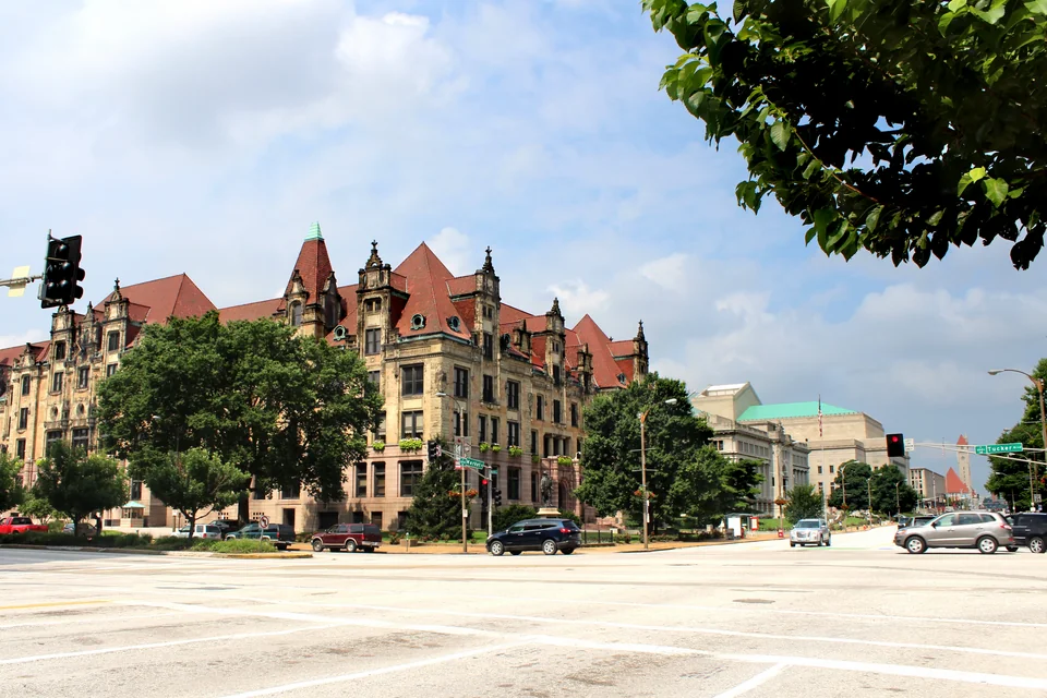 The turreted historic City Hall and a tree-lined street in St. Louis