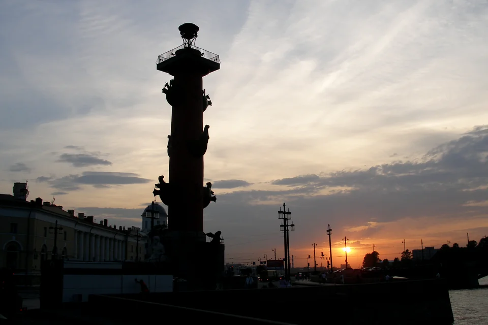 The silhouette of a Rostral Column at sunset, Saint Petersburg