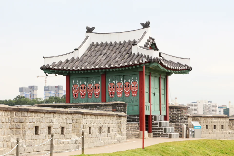 A painted traditional pavilion on the walls of Hwaseong Fortress in Suwon