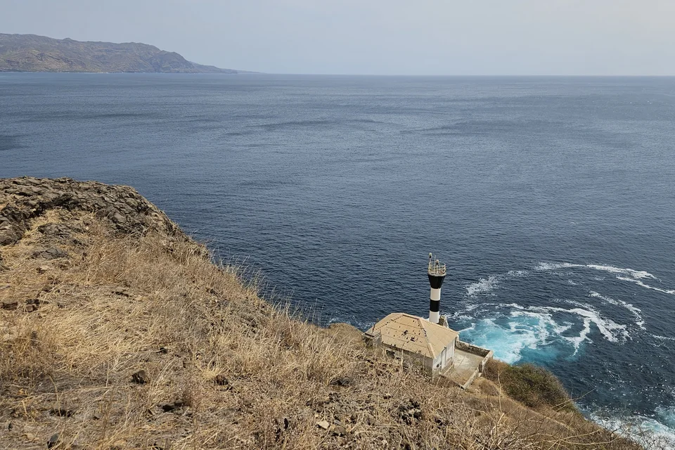 The Ponta Preta lighthouse on a dry headland above the Atlantic near Tarrafal