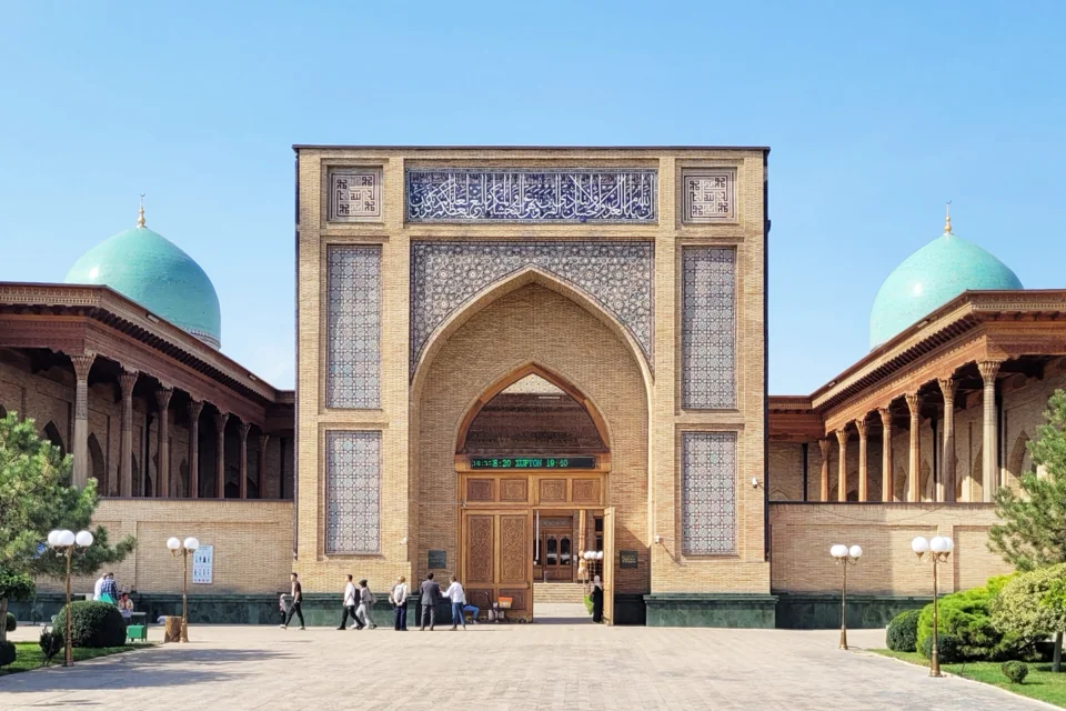 The entrance and turquoise domes of the Hazrati Imam Mosque in Tashkent