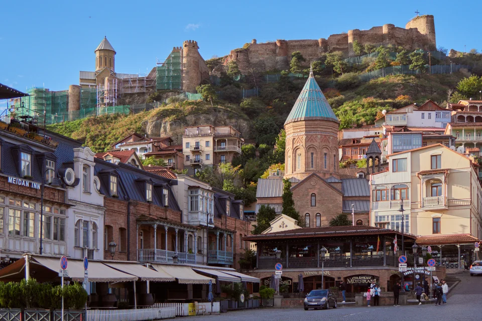 Narikala Fortress, a domed church and historic balconied houses in Old Tbilisi