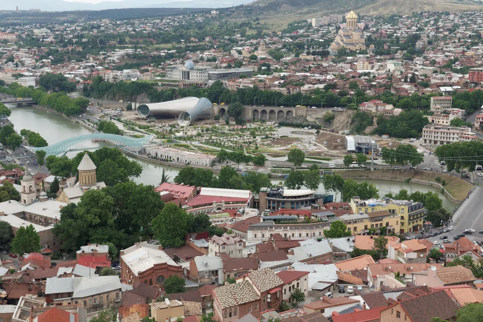 The Kura River, Rike Park and Sameba Cathedral on the hill in Tbilisi