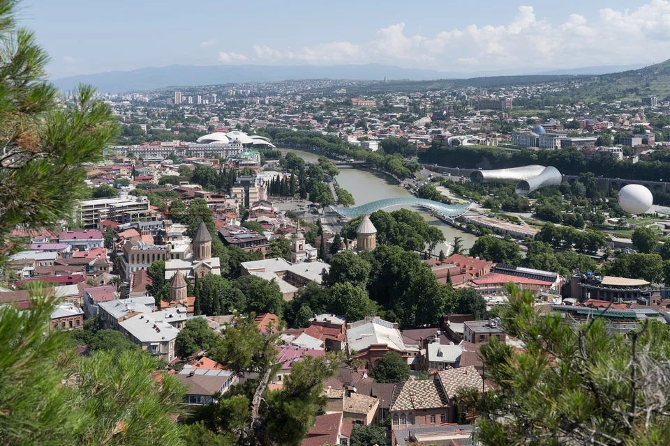 The old town, the river and modern buildings seen from Narikala, Tbilisi