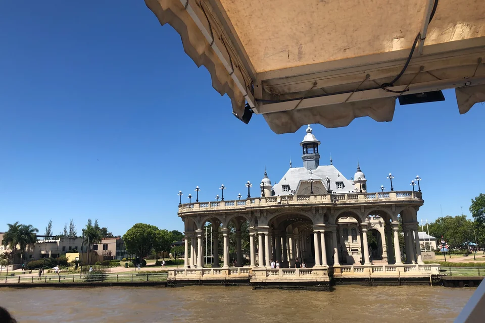 The domed historic rowing club building on the riverbank in Tigre