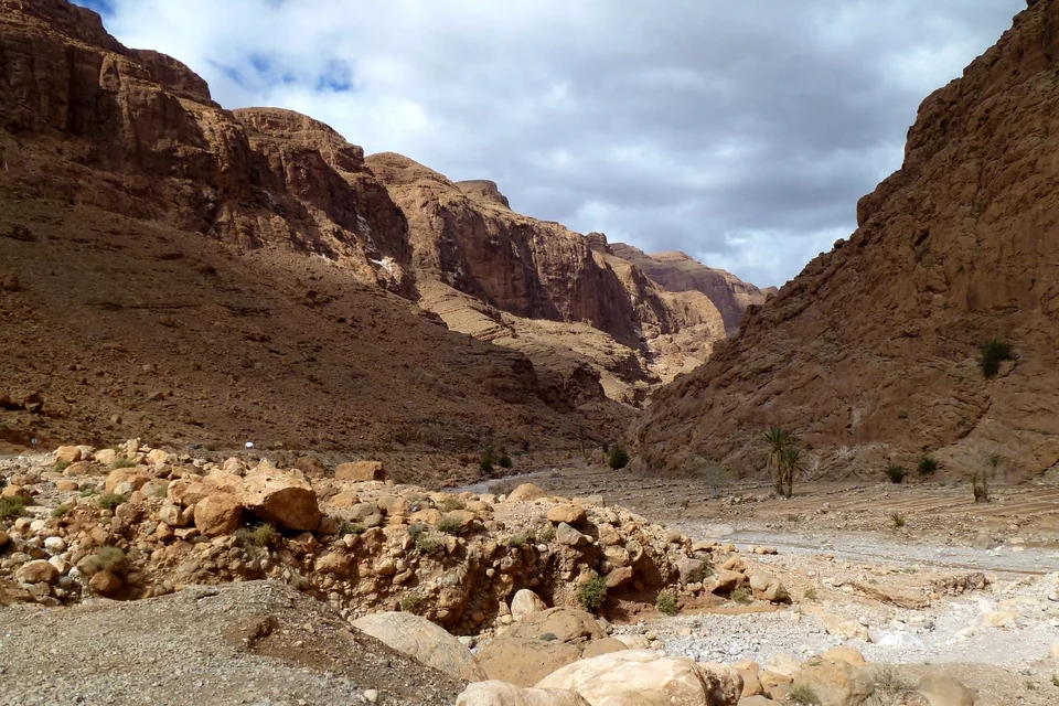 Rocky slopes and a dry riverbed in the Todra valley near Tinghir