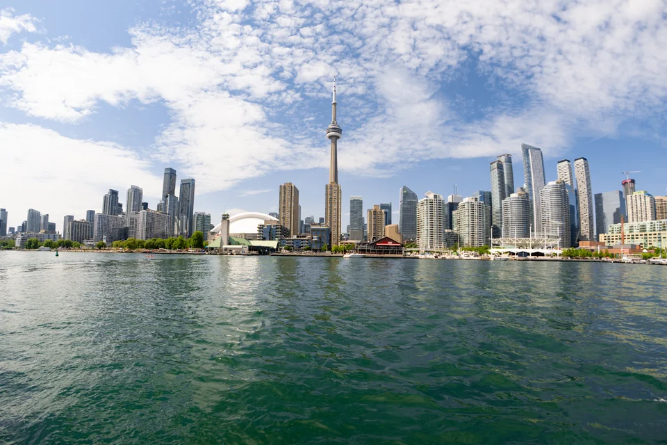 The CN Tower and the skyscraper skyline on the shore of Lake Ontario, Toronto