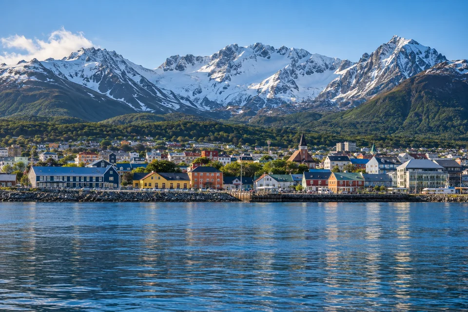 Ushuaia's colorful waterfront on the Beagle Channel below the snowy Martial mountains