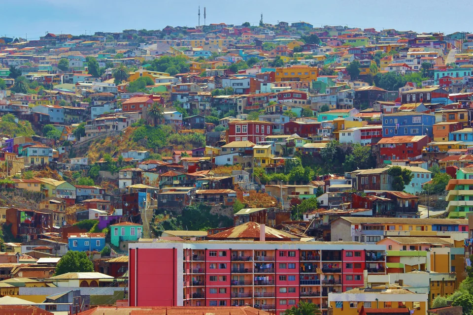 Brightly coloured houses spread over the hills of Valparaíso