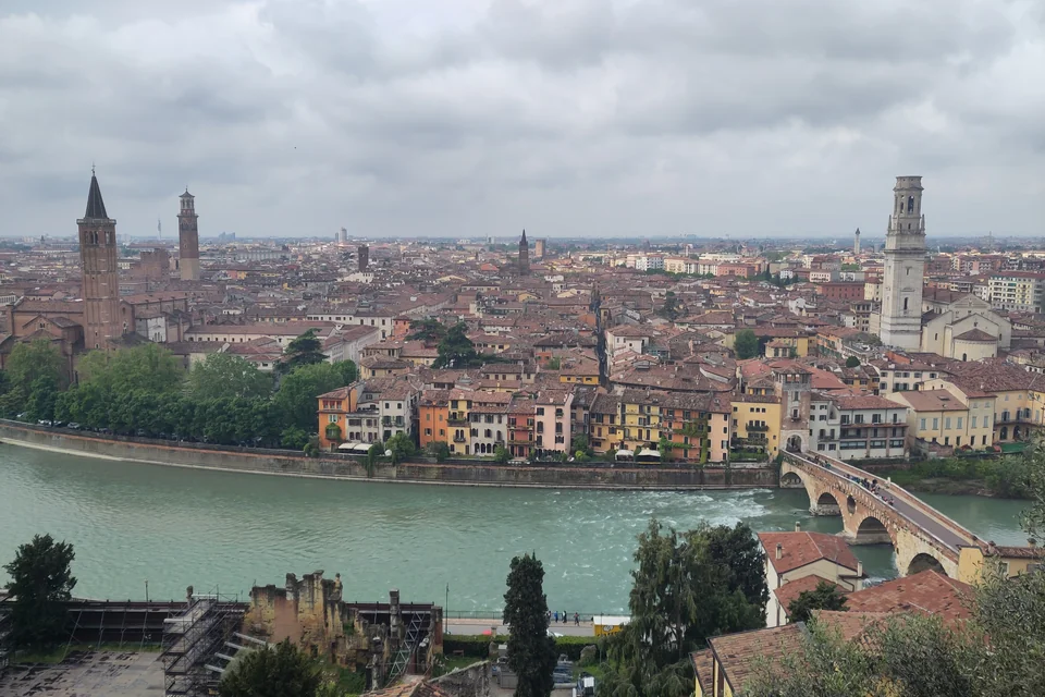 The Adige River, the Ponte Pietra and the towered old city of Verona seen from the hill
