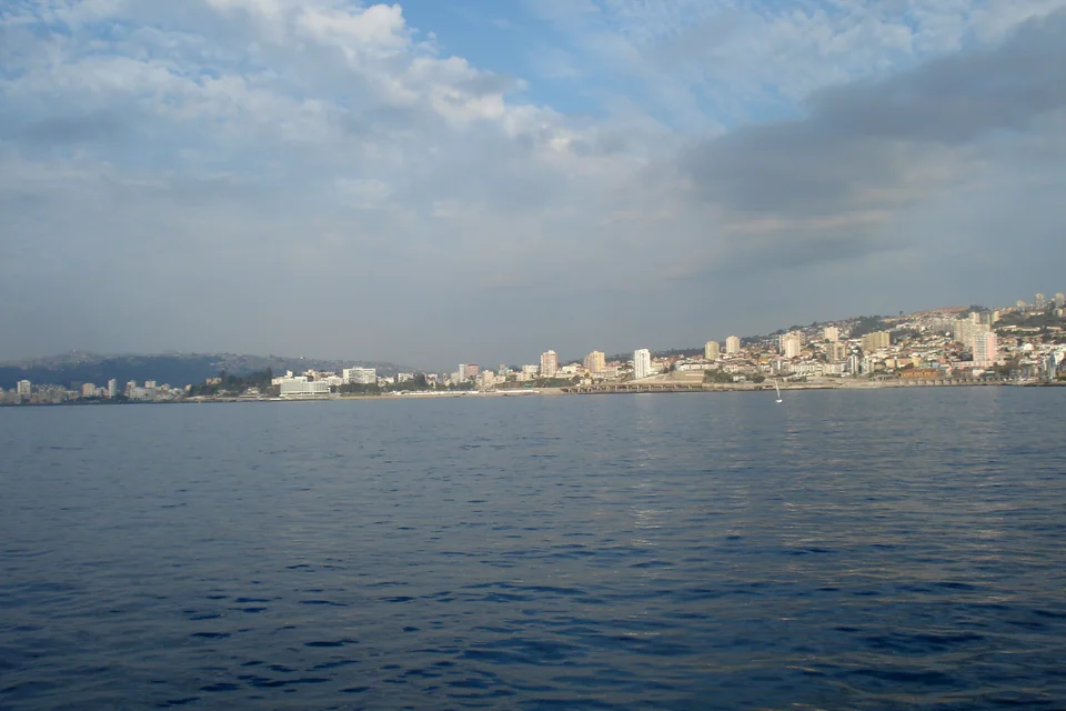 The city stretching along the bay at Viña del Mar under a cloudy sky