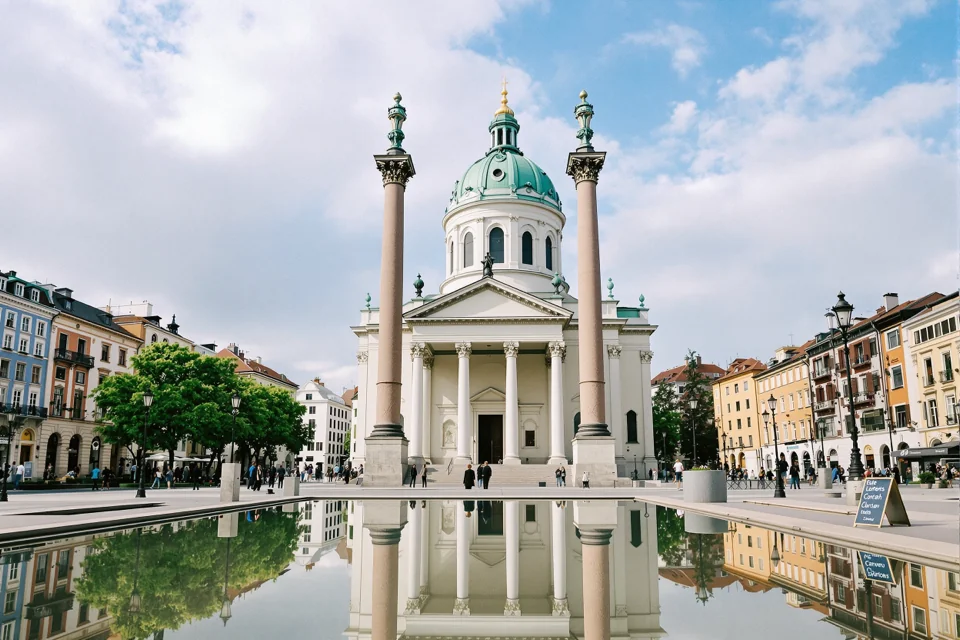 The green dome and twin columns of the Karlskirche in Vienna