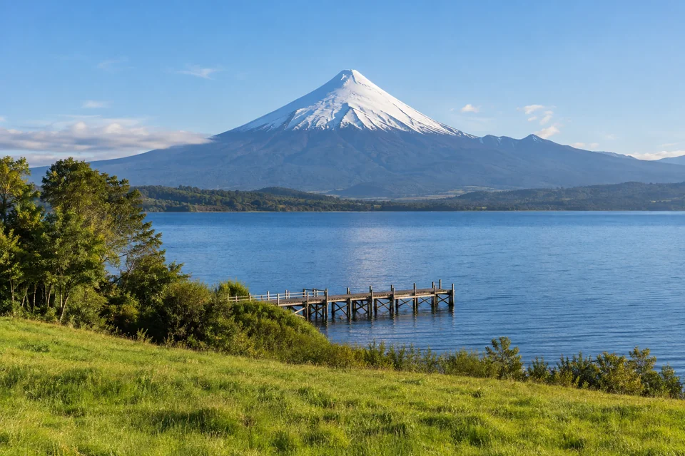 The snow-capped perfect cone of the Osorno Volcano above Lake Llanquihue in Chile