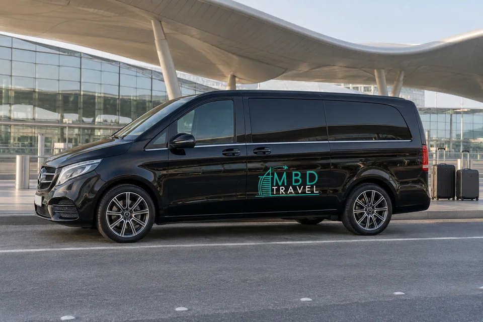Black Mercedes-Benz Vito with MBD Travel livery at AUH arrivals beside luggage, visualization