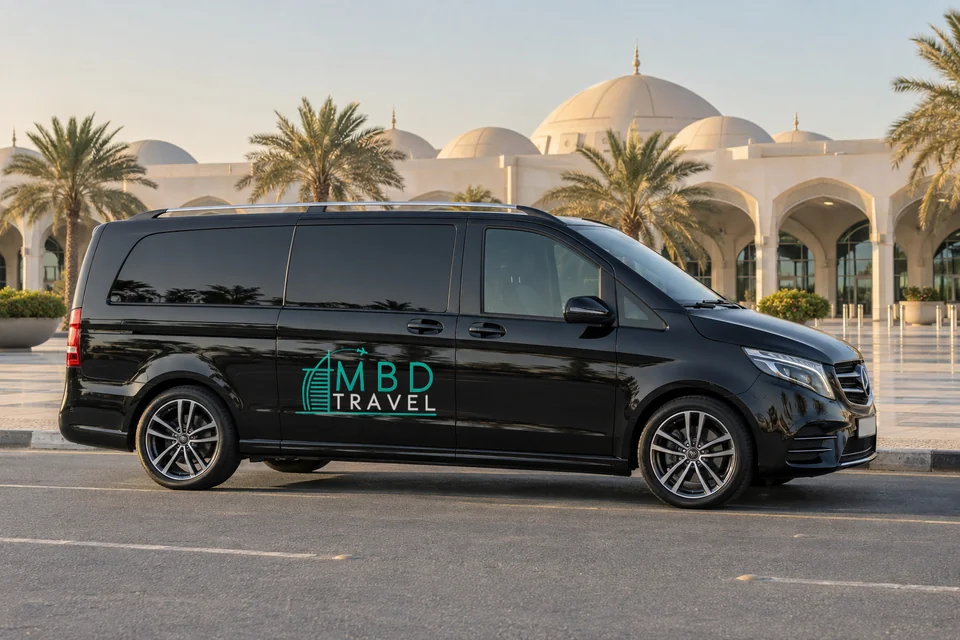 Black Mercedes-Benz Vito with MBD Travel livery at Sharjah terminal in morning light, visualization